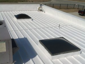 White coating on metal roof - roof coating Irving TX | Roof Coating Irving, TX | Anderson Industrial Roofing